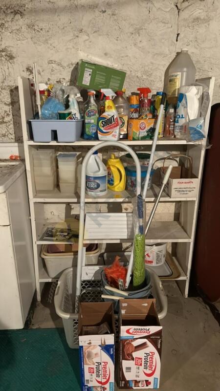 Shelving including cleaning products, protein shakes, and containers