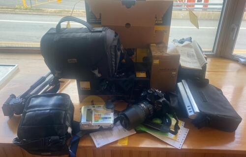 Nikon D5100 Digital Camera with 55-300 Lens and More