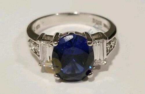 Sterling Silver Ring with Blue Topaz Stone