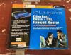 Linksys Router and Three Corded Phones - 2