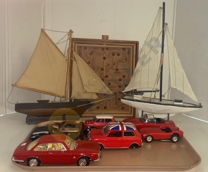 Model Sailboats, Model Cars, and Marble Game