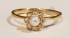 14K Gold Ring with Pearl and Diamond Chips