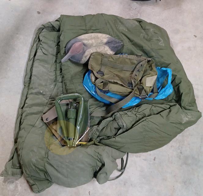 Military Sleeping Bag, Shovel, Water Canteen, and More