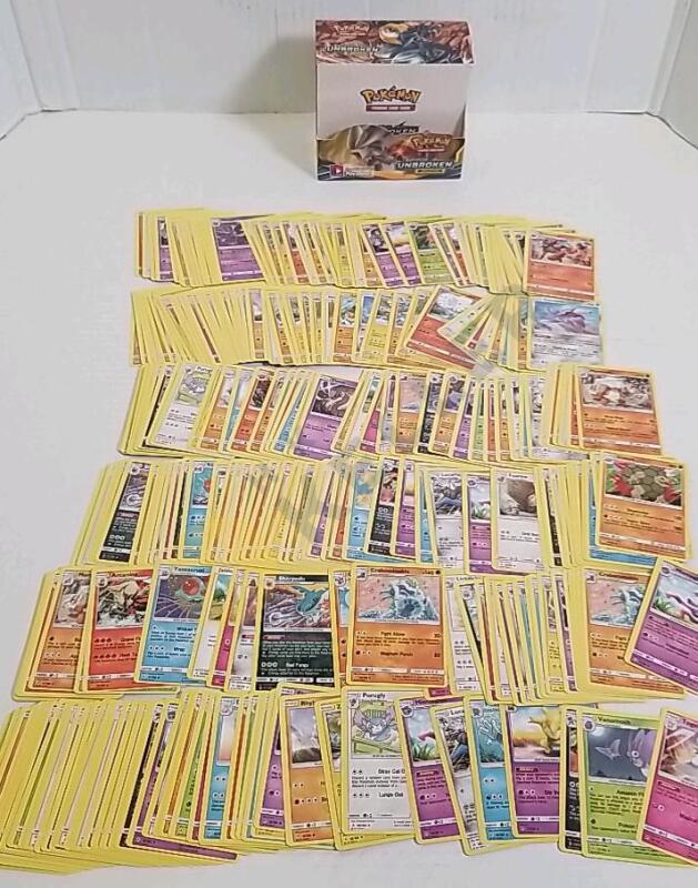 Approximately 300 Pokemon Sun & Moon Unbroken Bonds Trading Cards From 2019