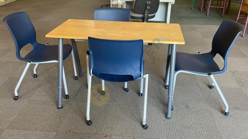 Work Table and 4 Plastic Rolling Chairs