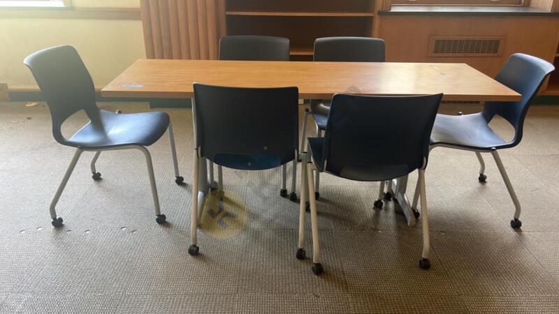 Work Table with 6 Rolling Plastic Chairs