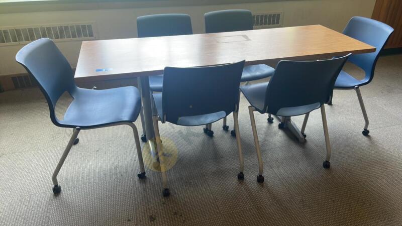 Work Table With 6 Rolling Plastic Chairs