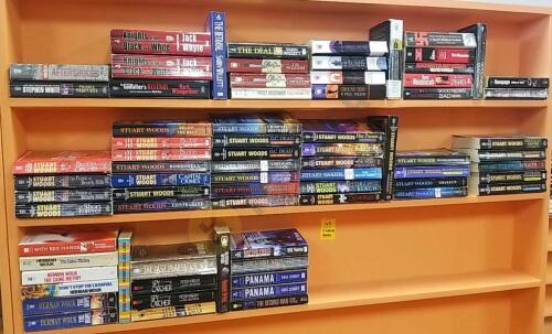 3 Shelves of Paperback Adventure Suspense Novels