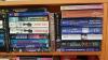 Variety of Paperback Mystery Novels On 3 Shelves - 4