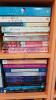 7 Shelves of a Variety of Fiction Books - 9