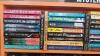 Variety of Paperback Mystery Novels On 3 Shelves - 2