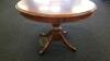 Ashley Casegoods Wooden Pedestal Round Table with Glass Top