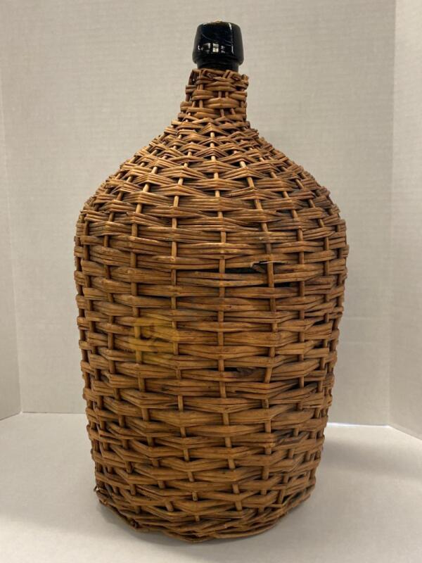 Vintage Green Demijohn Bottle Wrapped in Wicker