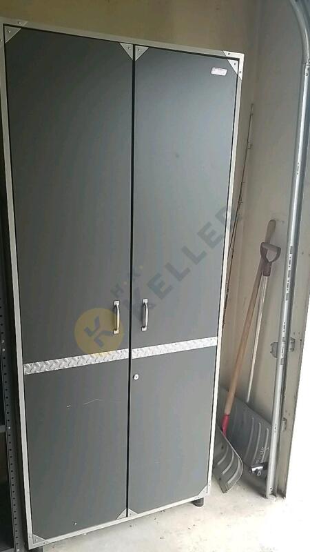 Coleman Storage Cabinet With Contents and Items To The Right Of Unit