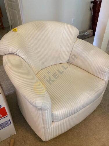 Cream Upholstered Swivel Chair