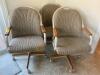 Three Swivel Arm Chairs