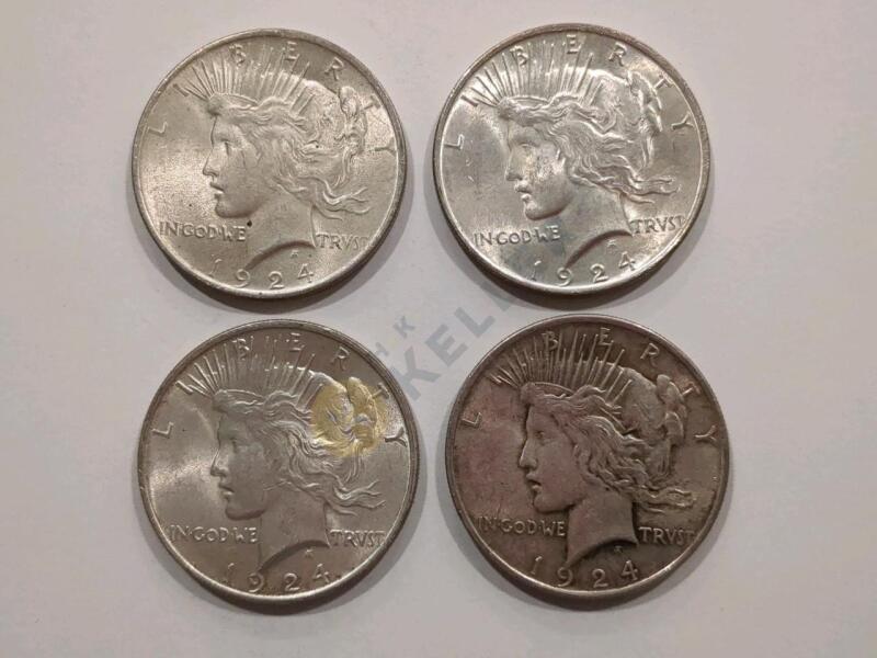 Four 1924 Peace Silver Dollar Coins