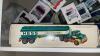 Shelf of Hess Collectible Trucks - 2